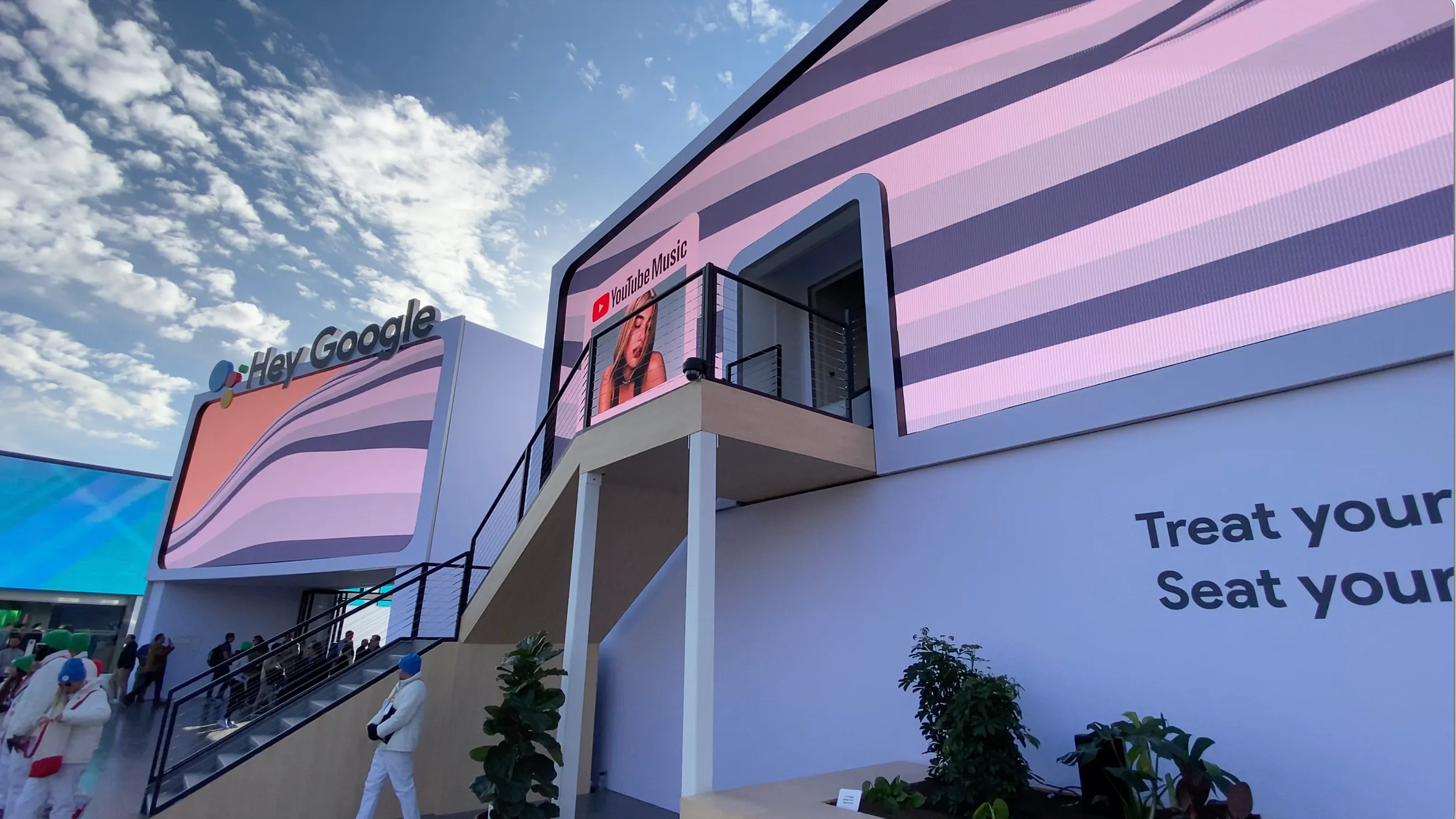 Google Assistant Playground CES 2020 big outdoor screen showing the dynamic music visualizer for Dua Lipa's song Don't Start Now