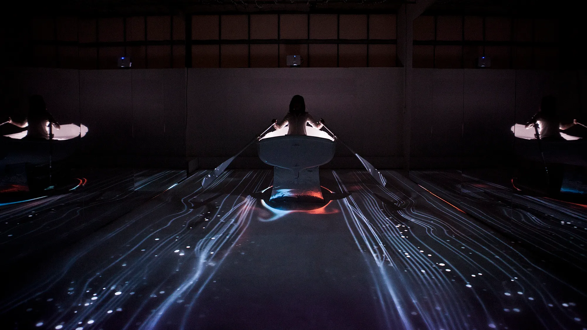 An intercative art installation where you row through enchanting visuals.