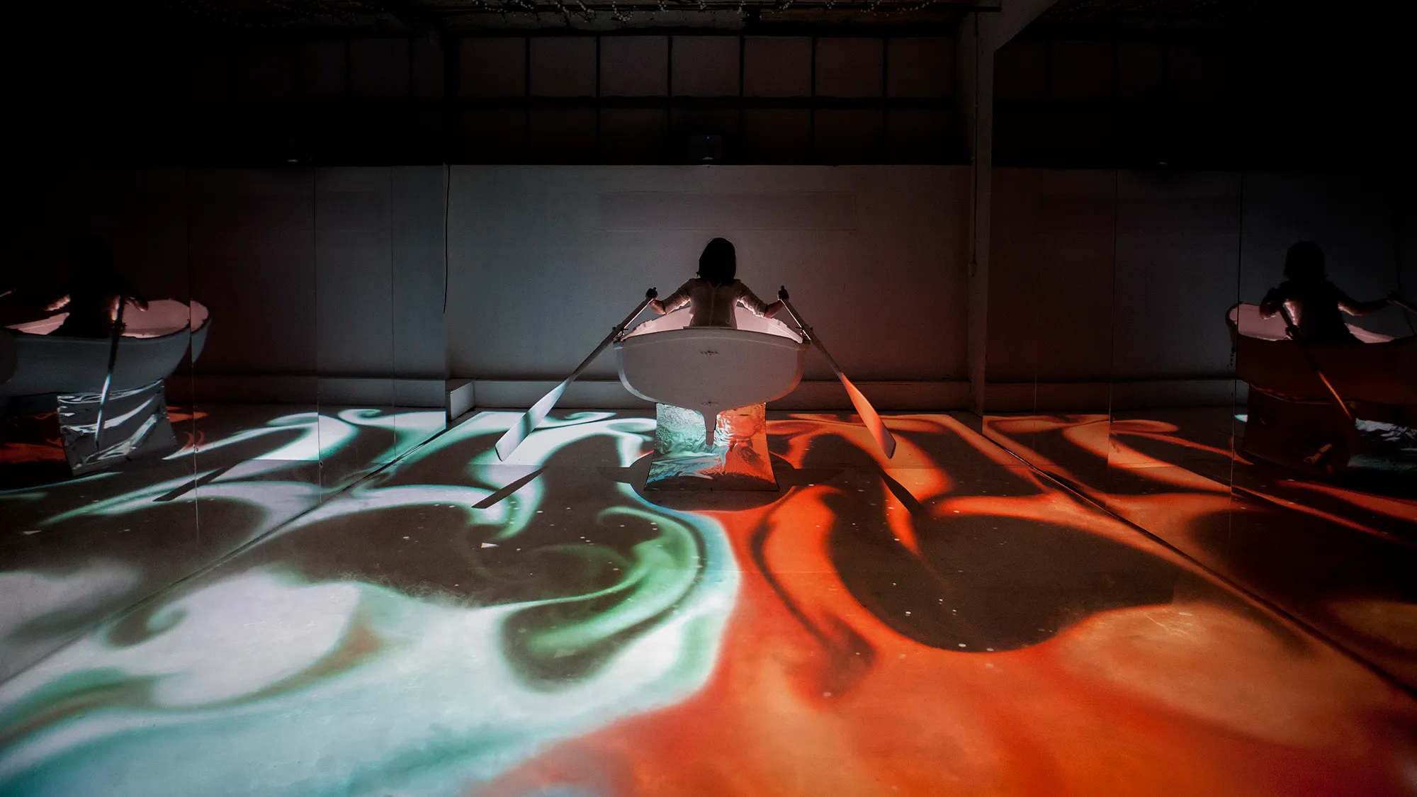 Floating - An immersive installation where you row through enchanting visuals