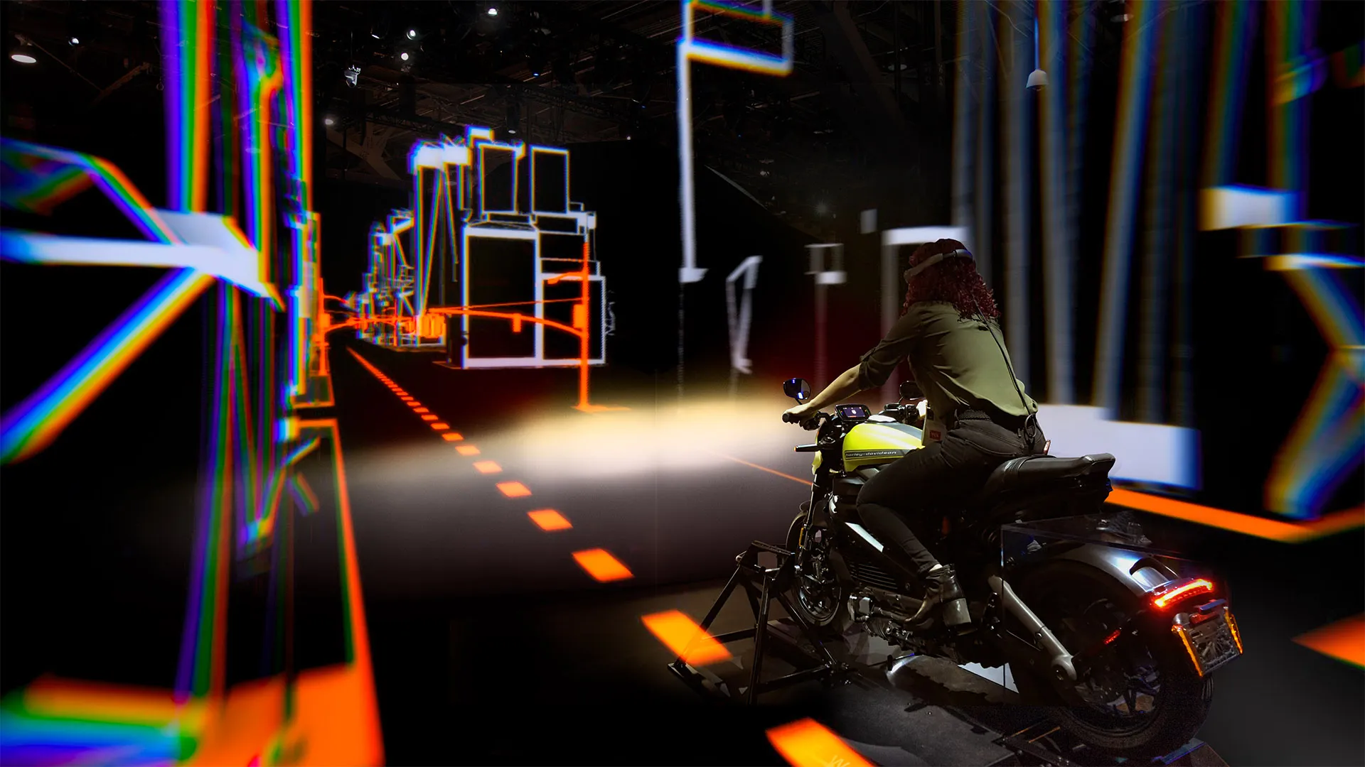 Woman experiences harley davidson electric motorcycle vr experince at CES in Las Vegas