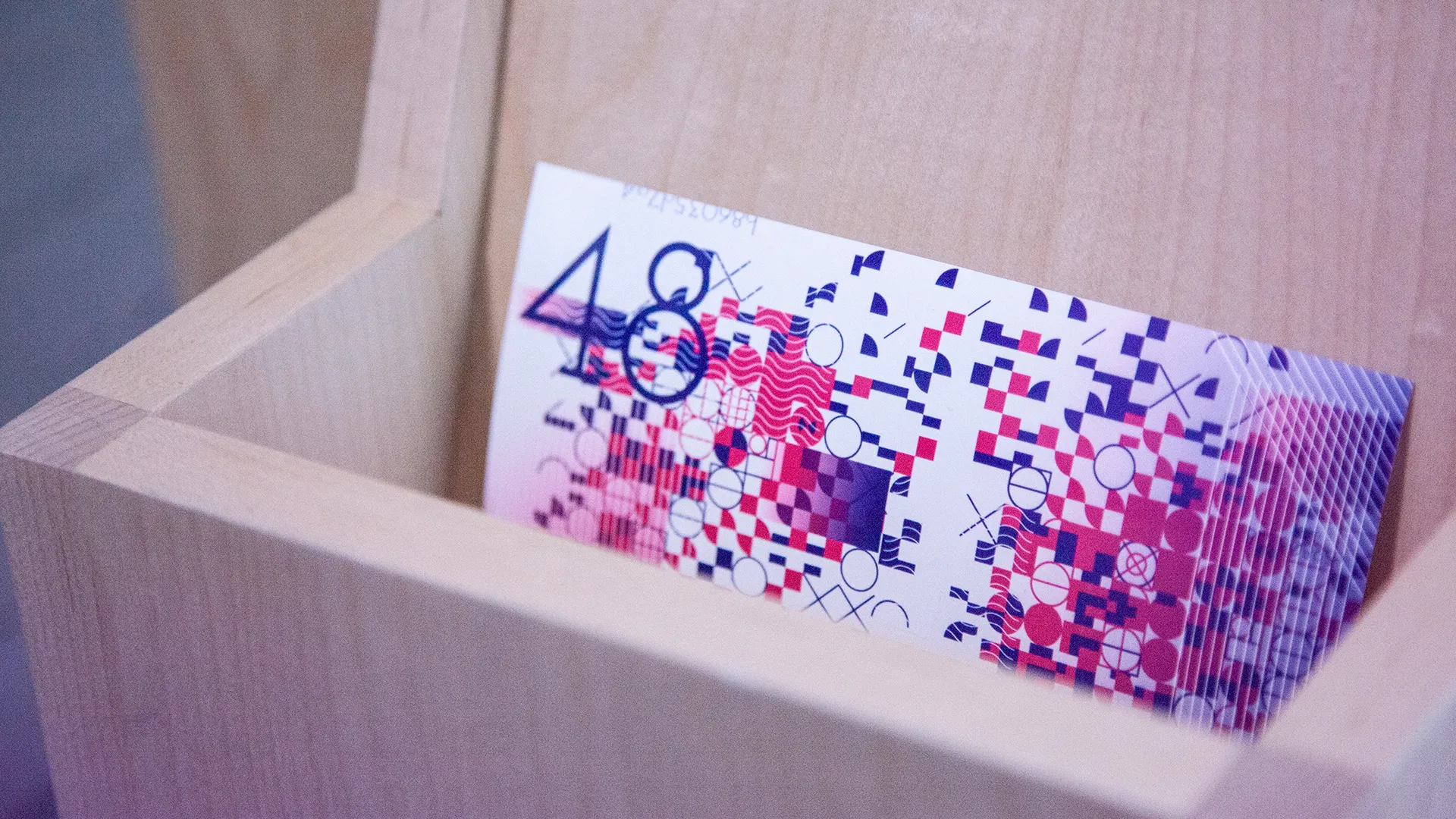 the unqiue blockchain art is printed and spits out on the side of the bench